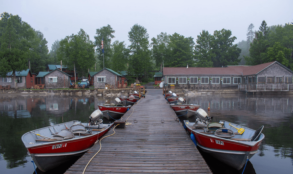 dock with boats foggy